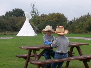 glamping tipi with children playing