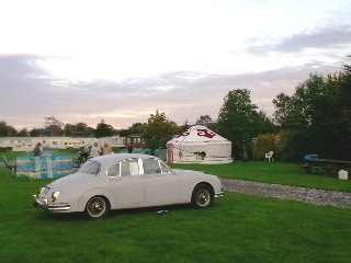 glamping guest enjoy a yurt holiday and barbecue